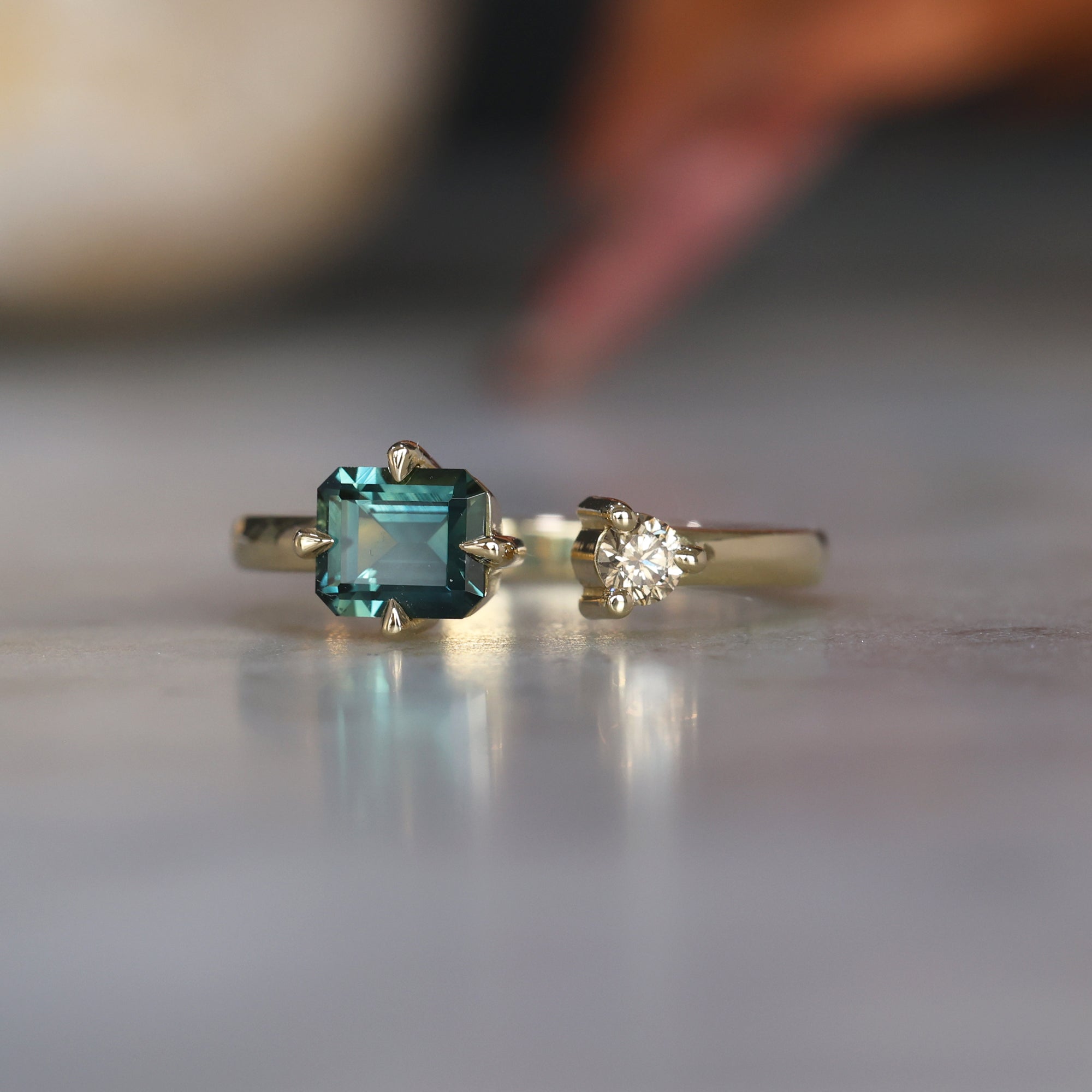 0.95ct Emerald Cut australian parti sapphire and champagne diamond ring