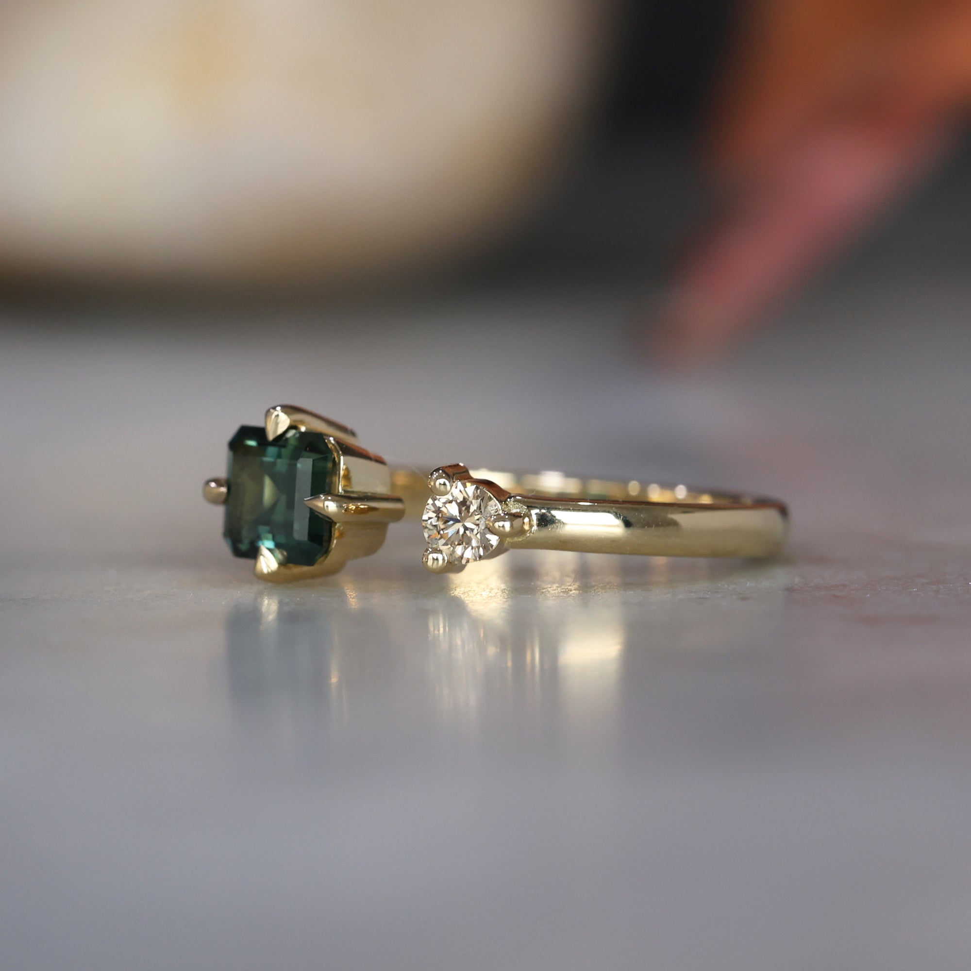 0.95ct Emerald Cut australian parti sapphire and champagne diamond ring