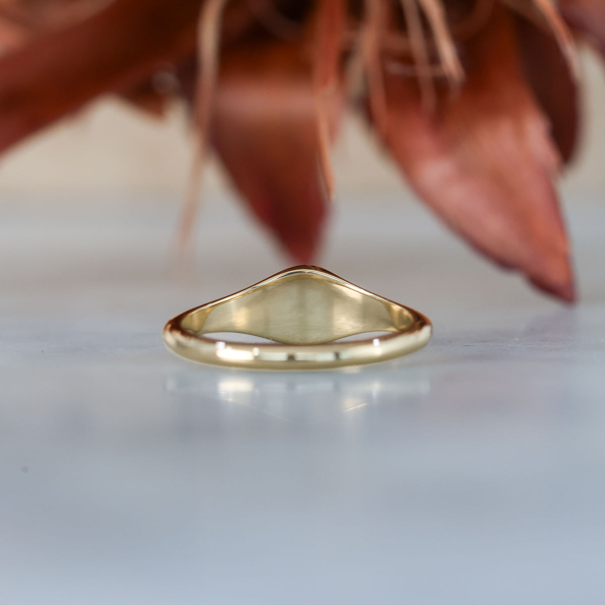 unique Ceylon sapphire and diamond signet ring in yellow gold