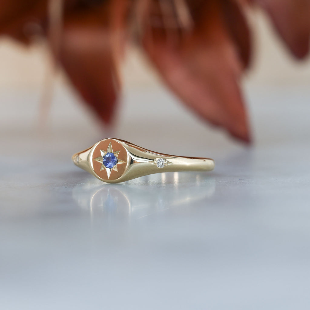 unique Ceylon sapphire and diamond signet ring in yellow gold