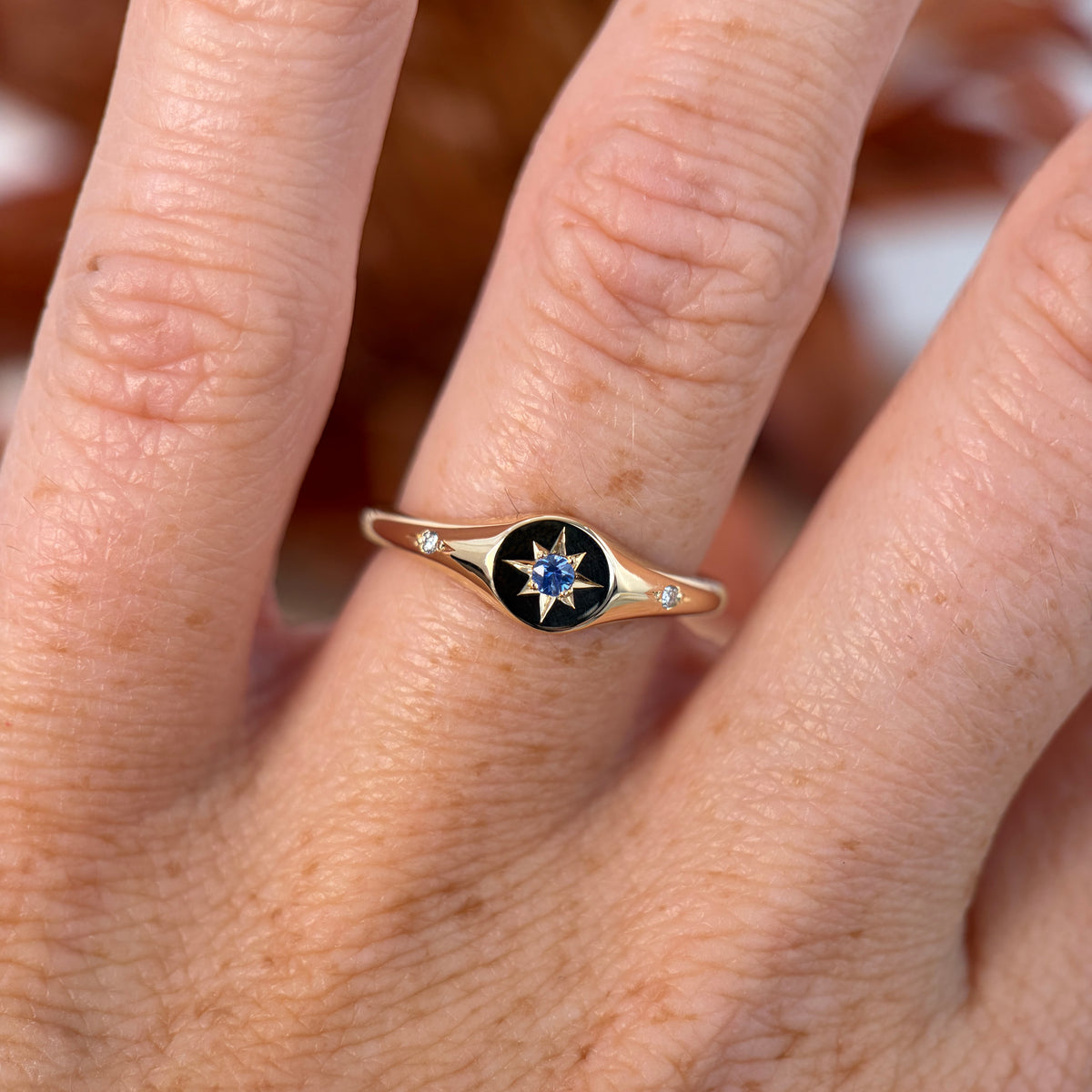 unique Ceylon sapphire and diamond signet ring in yellow gold