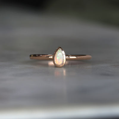 PETITE PEAR CUT OPAL / BEZEL RING