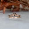 0.58ct Montana Sapphire trilogy engagement ring back view, rose gold band