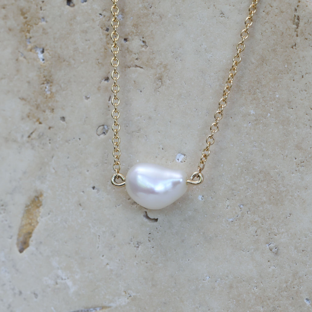 East west natural pearl necklace