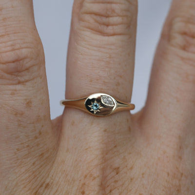 Ellipse star set australian sapphire and diamond signet ring on hand