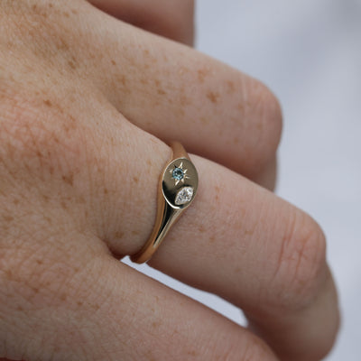 Ellipse star set australian sapphire and diamond signet ring on hand