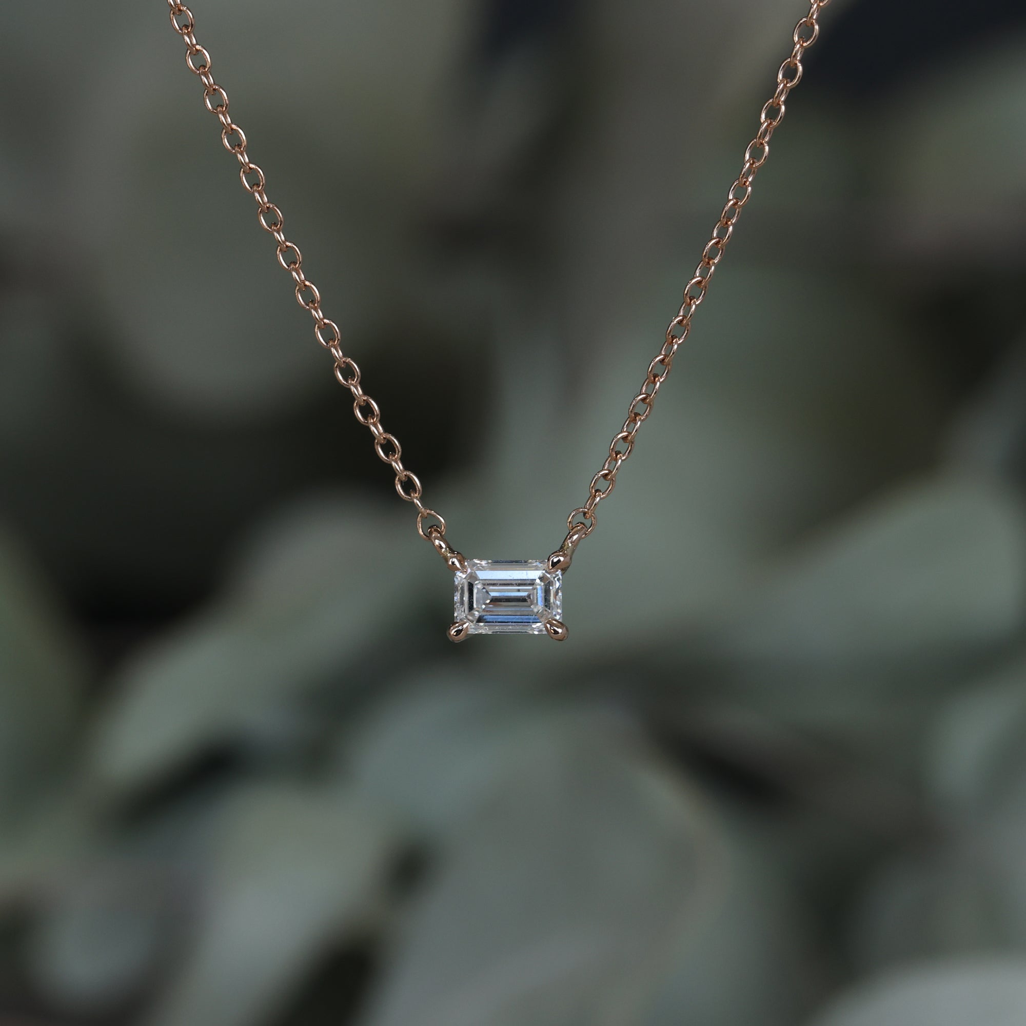 Emerald cut diamond necklace