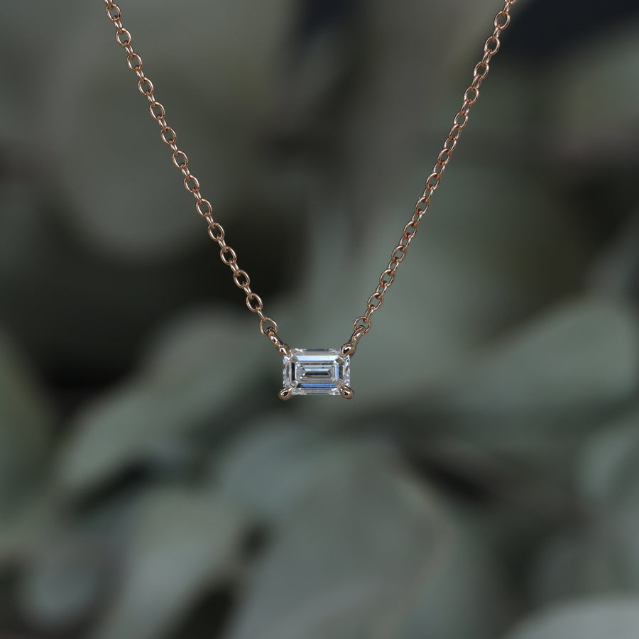 Emerald cut diamond necklace
