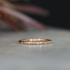 Flat diamond wedding band with star details 