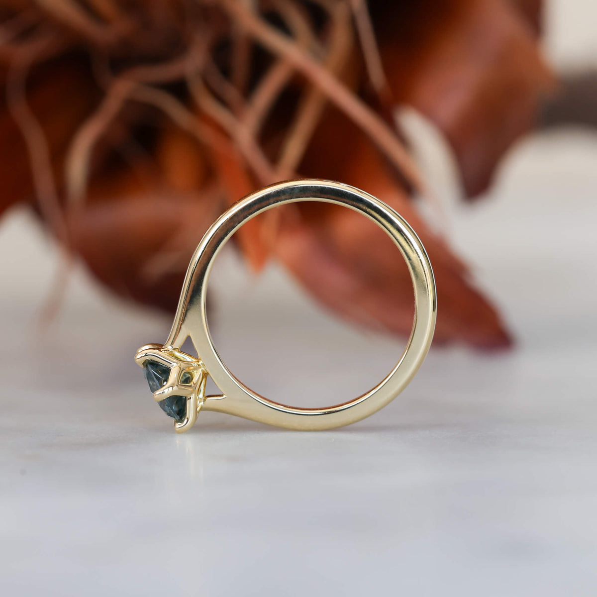 Lotus 1.01ct round cut montana sapphire engagement ring with a cathedral setting