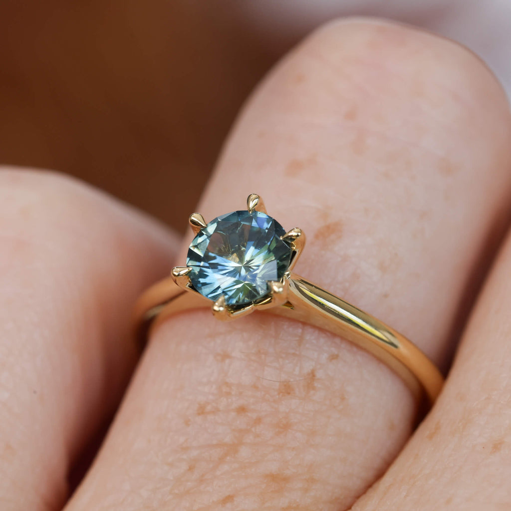 Lotus 1.01ct round cut montana sapphire solitaire engagement ring with cathedral setting