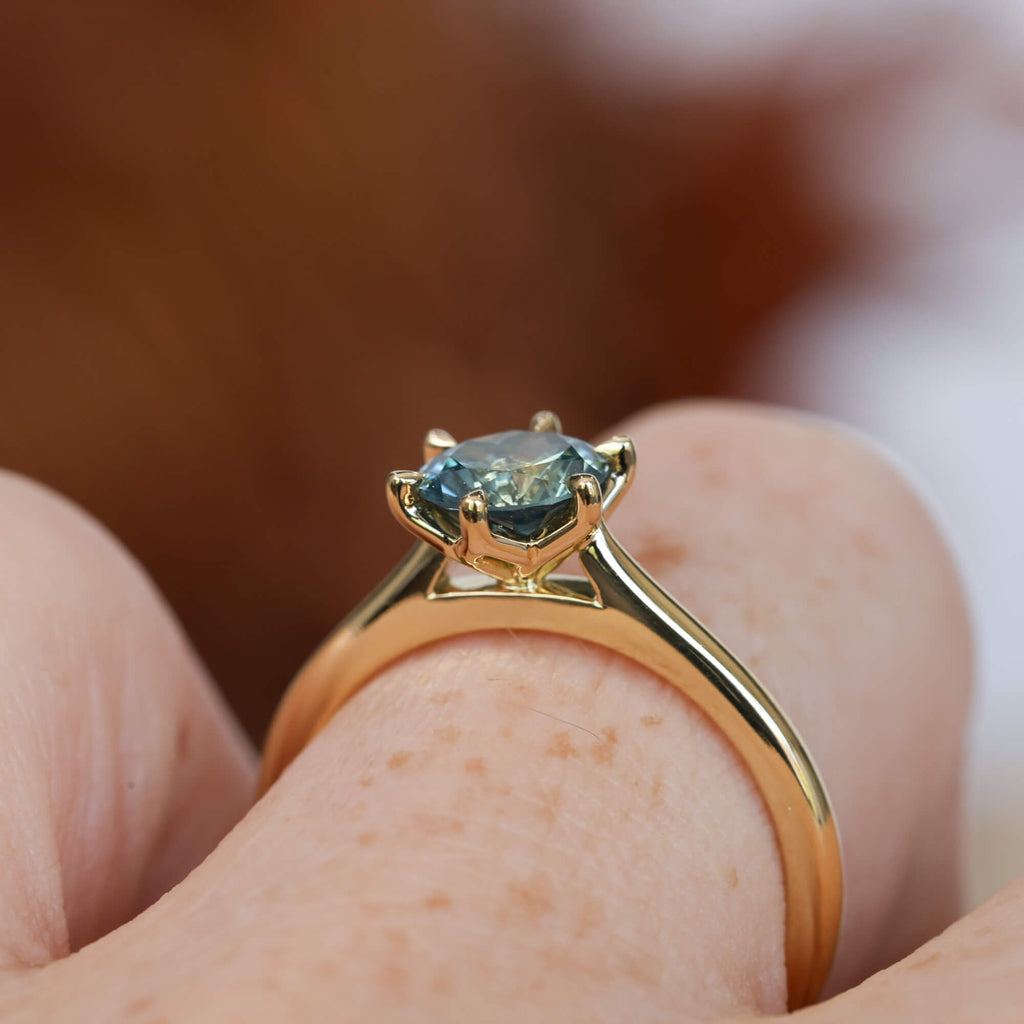 Lotus 1.01ct round cut montana sapphire solitaire engagement ring with cathedral setting