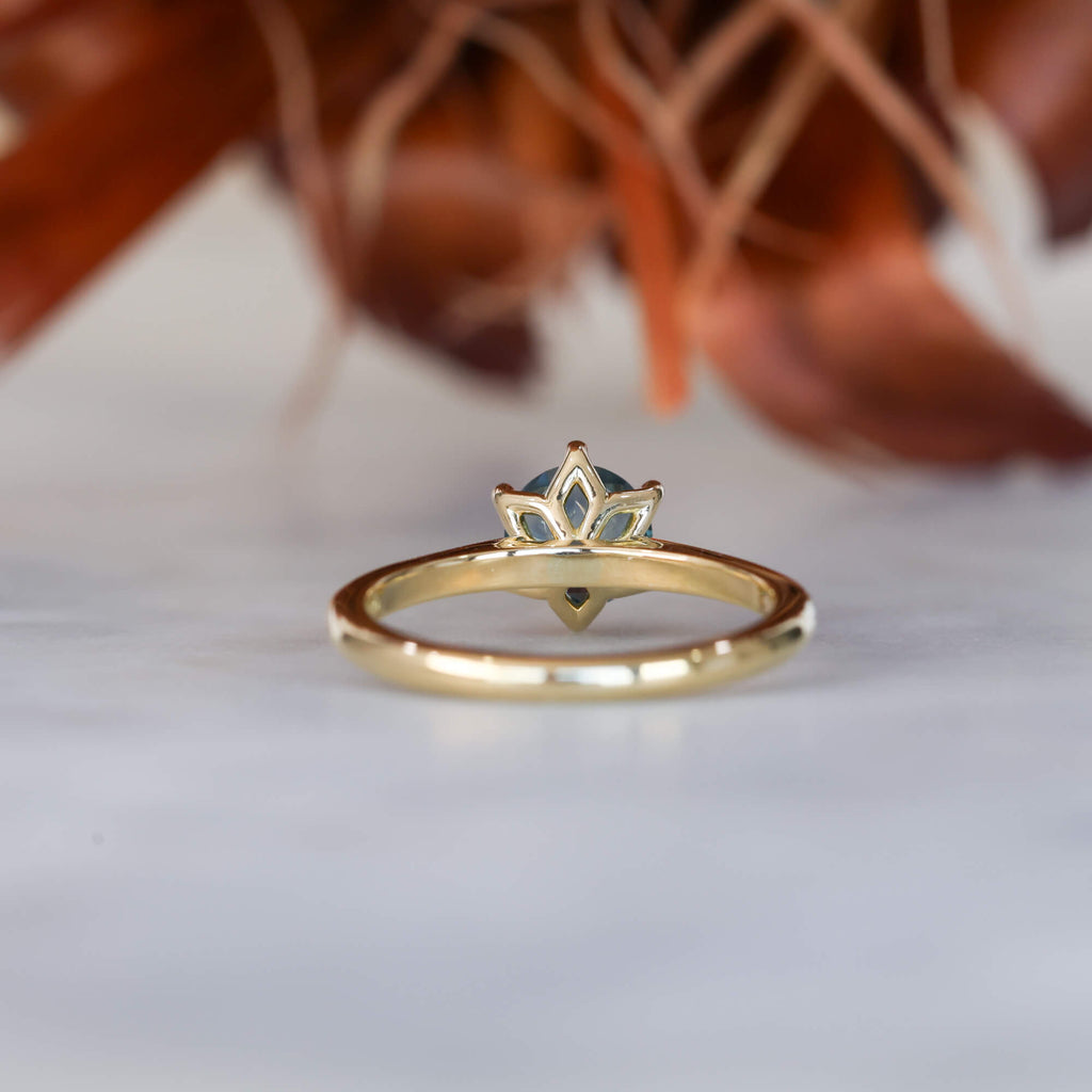 Lotus 1.01ct round cut montana sapphire solitaire engagement ring with cathedral setting