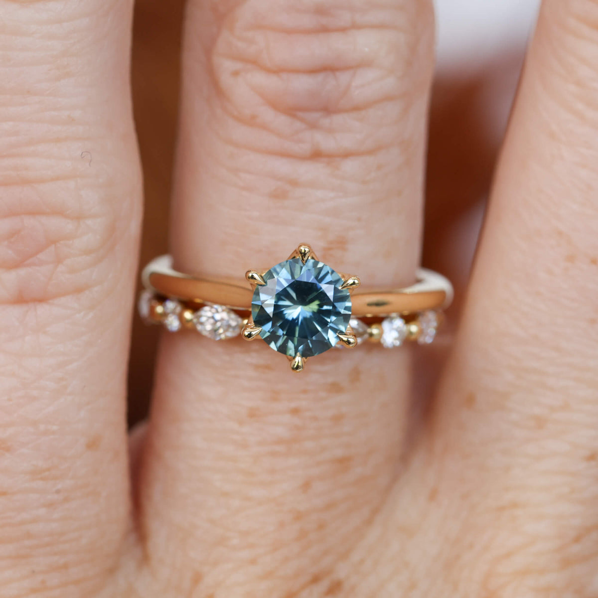 Lotus 1.01ct round cut montana sapphire solitaire engagement ring with cathedral setting