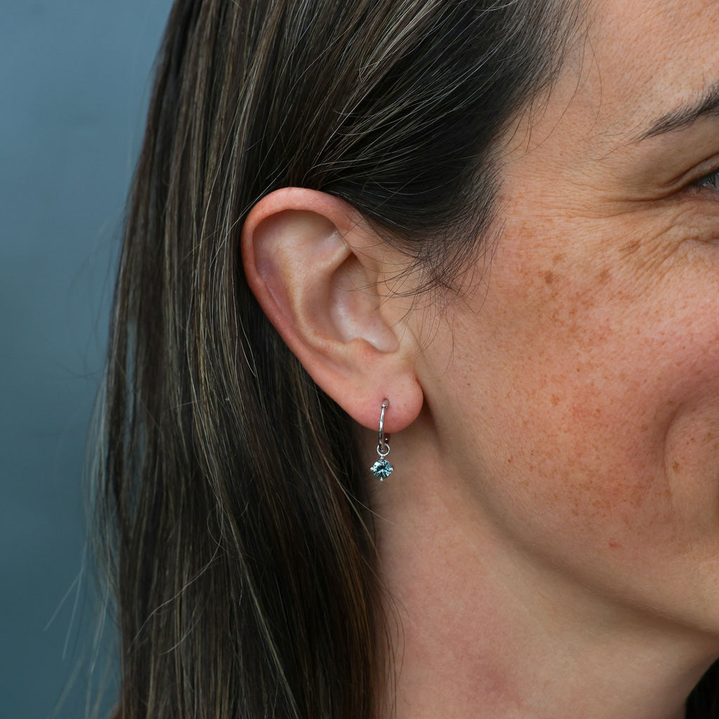 Madagascan Sapphire hoop earrings in ear