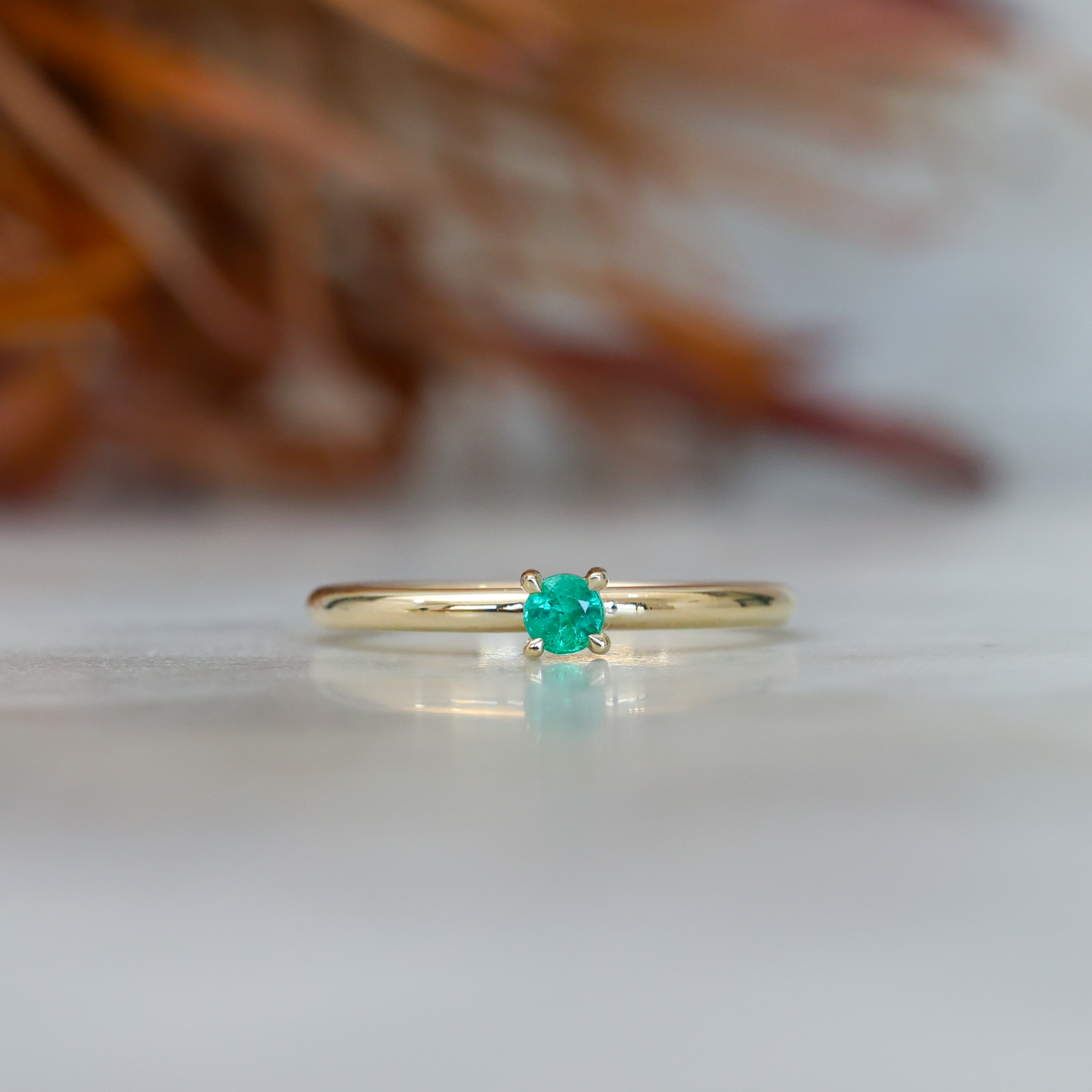 mays birthstone mini stack ring with an emerald
