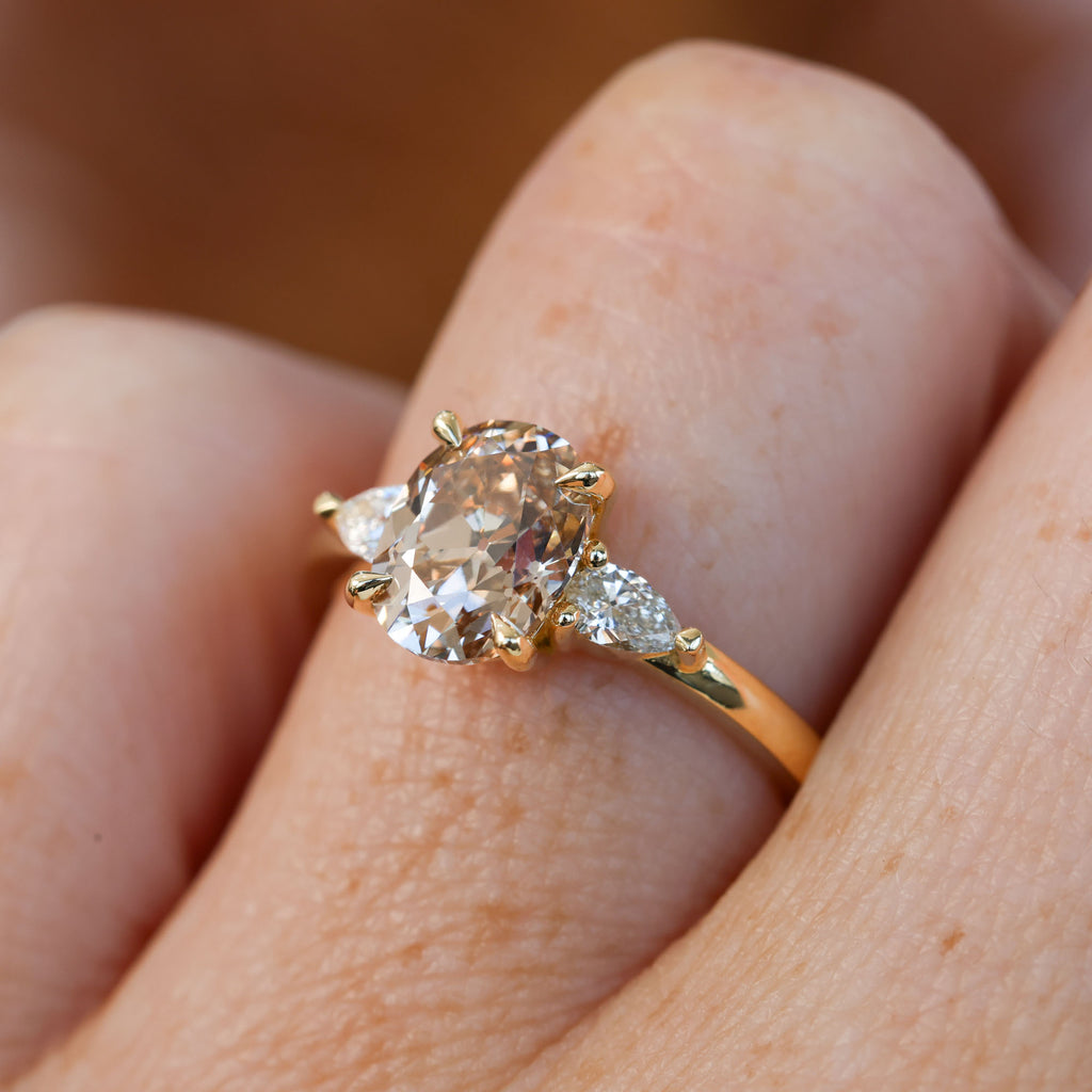brown 1.86ct old mine cushion cut lab created diamond trilogy engagement ring yellow gold on hand