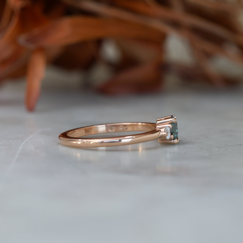 0.58ct Montana Sapphire trilogy engagement ring side view