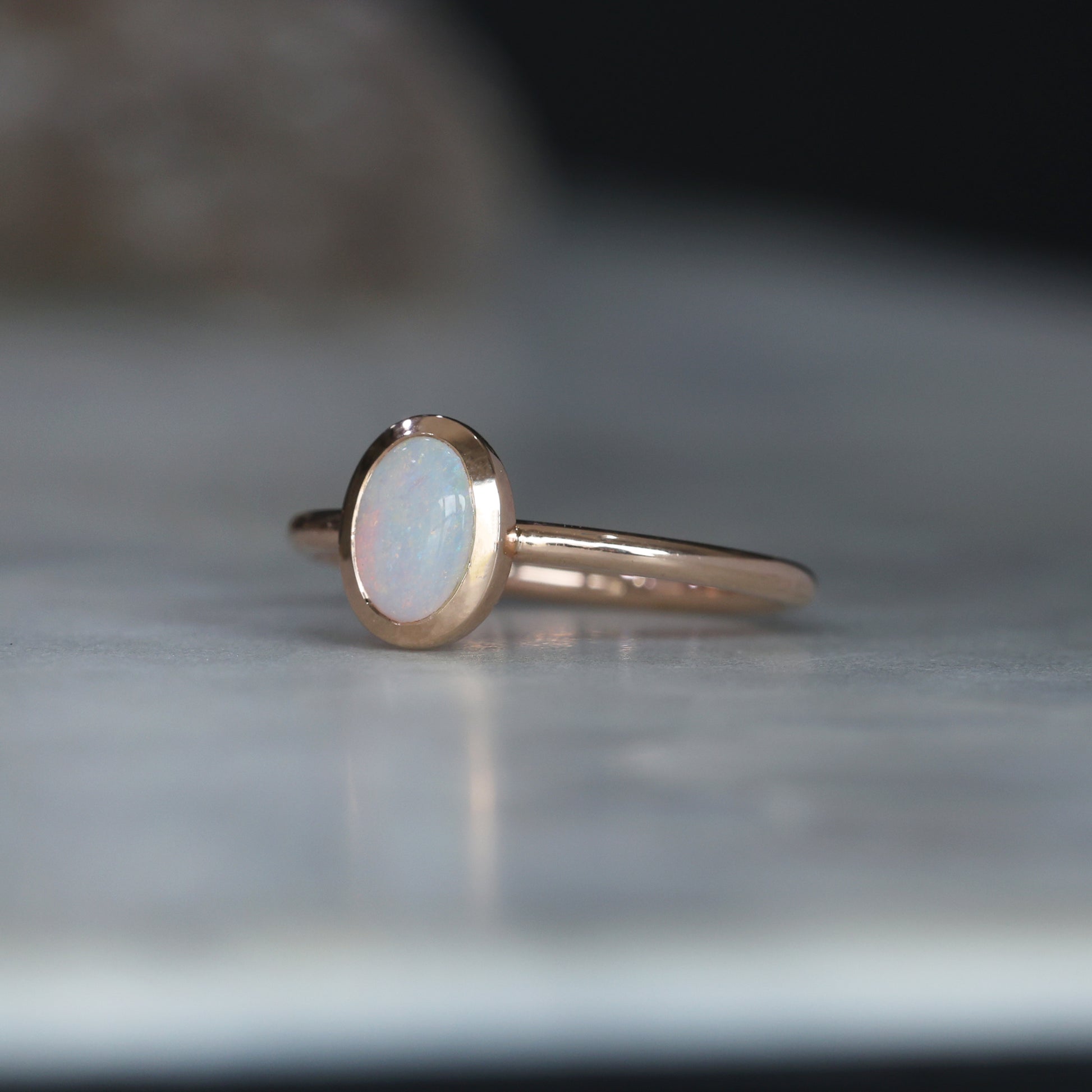 OVAL CUT OPAL / BEZEL SET RING