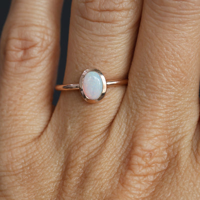 OVAL CUT OPAL / BEZEL SET RING