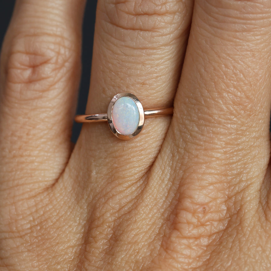 OVAL CUT OPAL / BEZEL SET RING