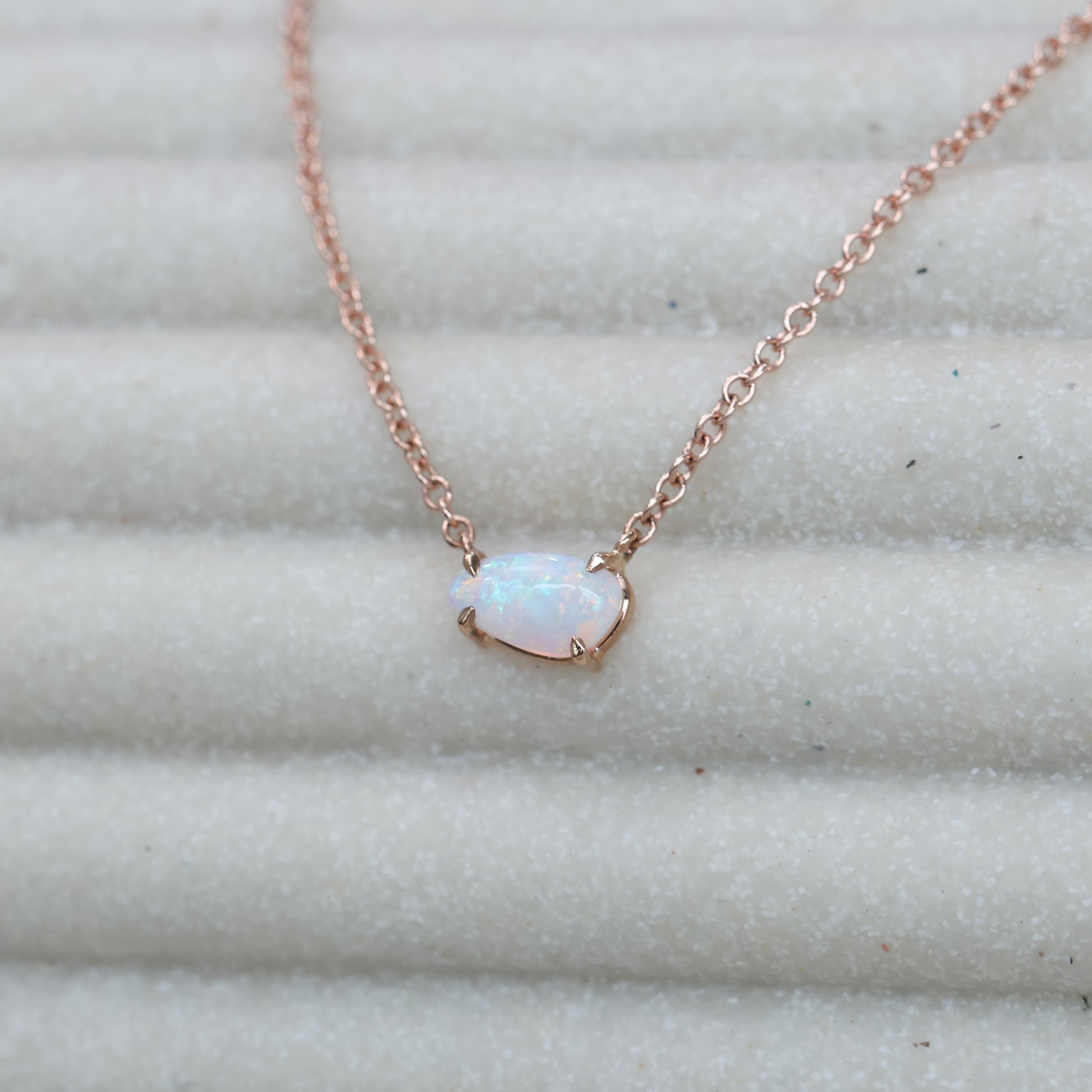 Petite freeform east west opal necklace side