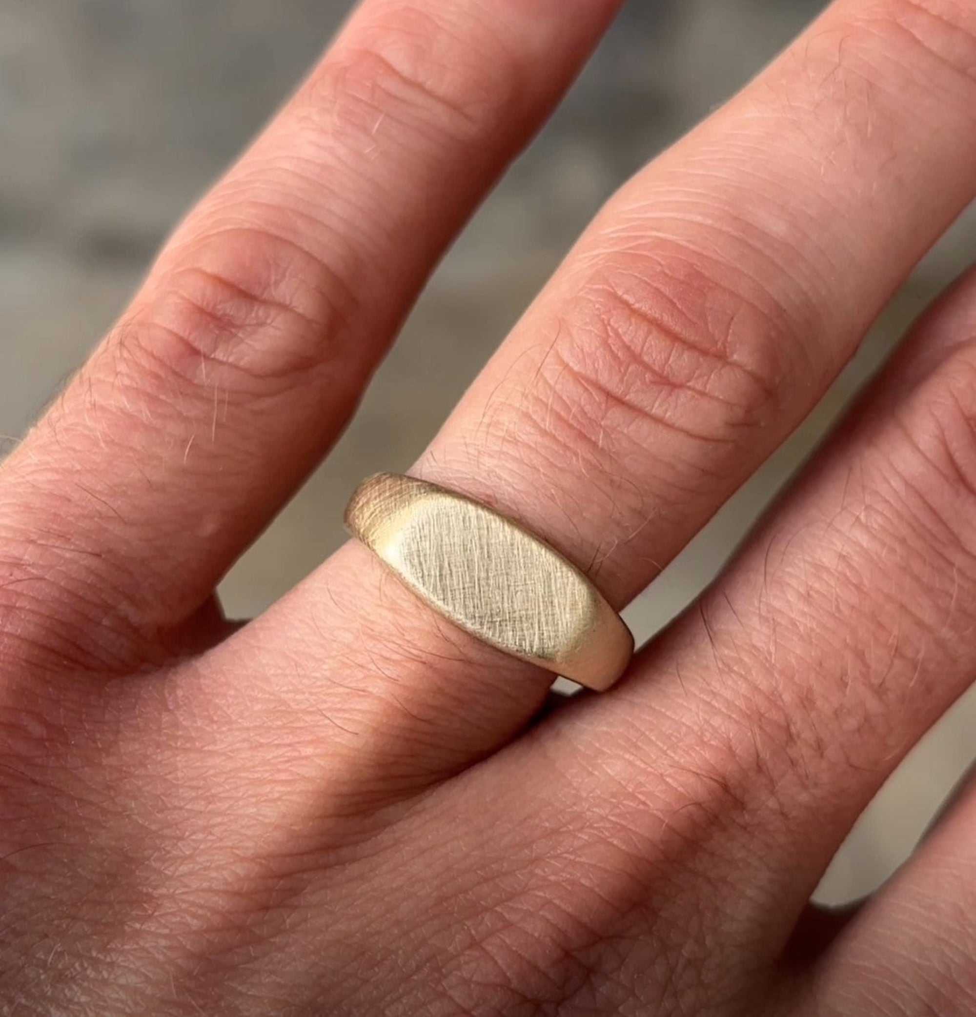 Rectangle Cushion Signet Ring on hand