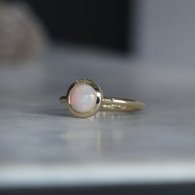 ROUND CUT OPAL / BEZEL SET RING