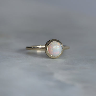 ROUND CUT OPAL / BEZEL SET RING