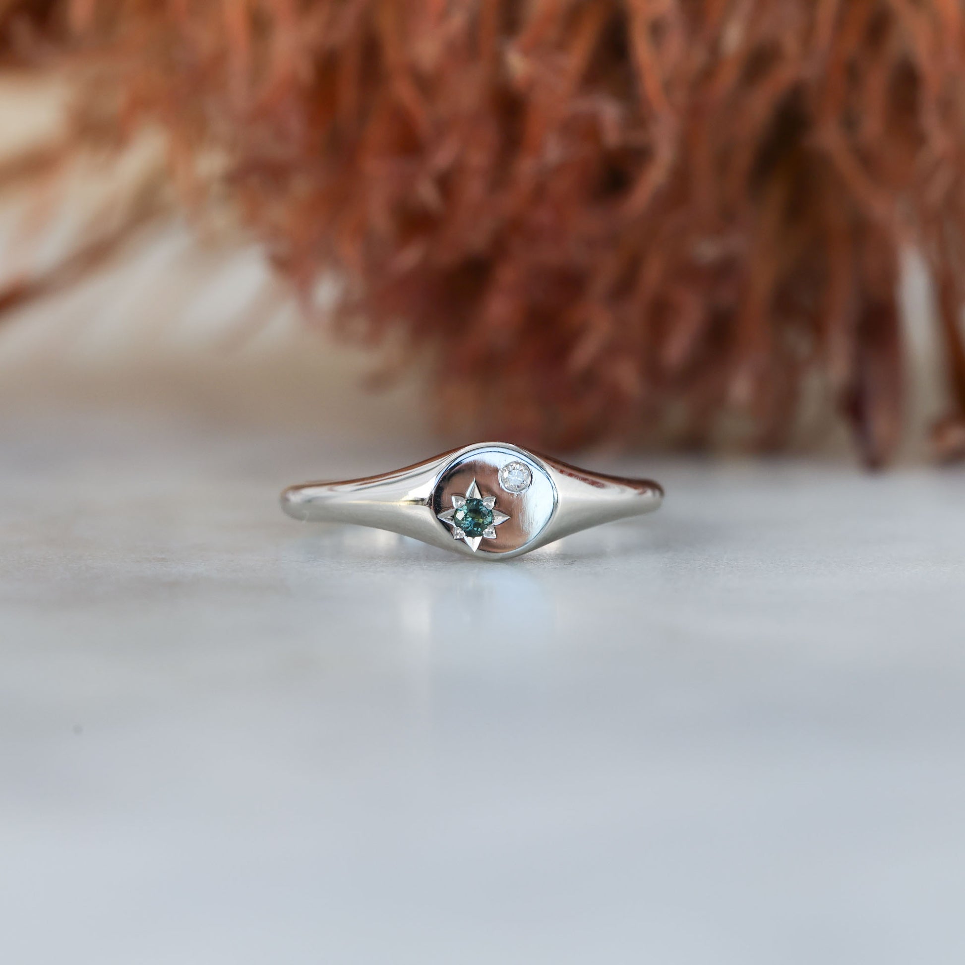 round australian sapphire and diamond signet ring white gold