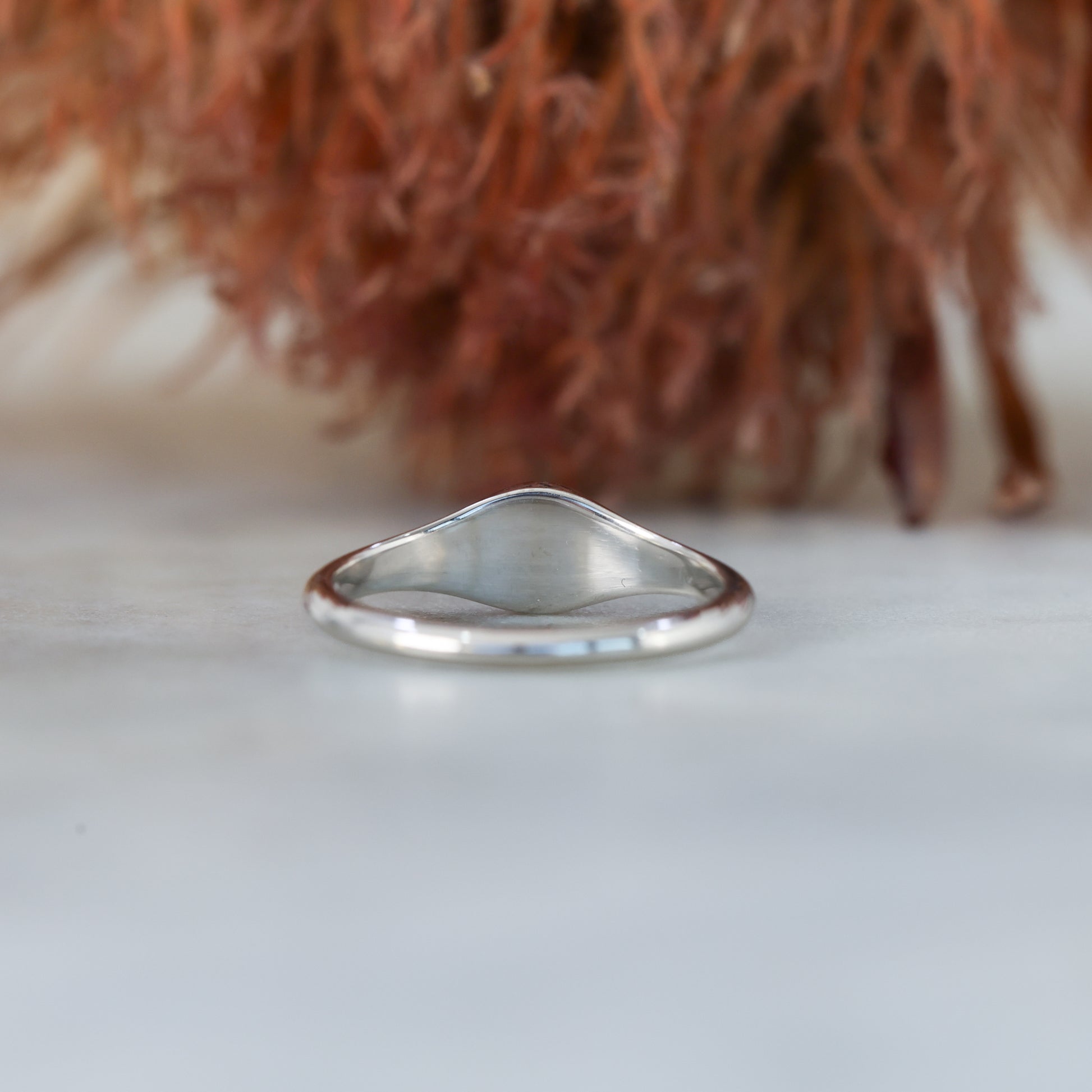 round australian sapphire and diamond signet ring white gold