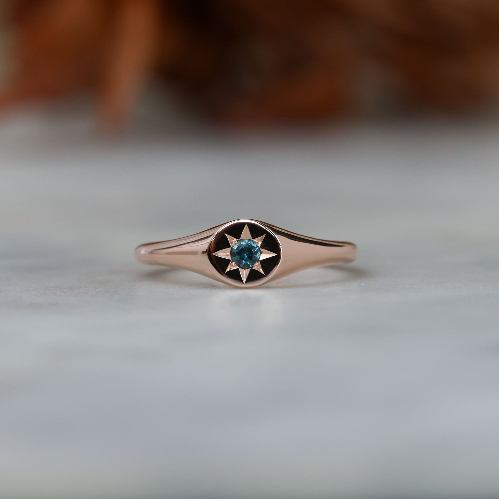 round star set australian sapphire signet ring in rose gold