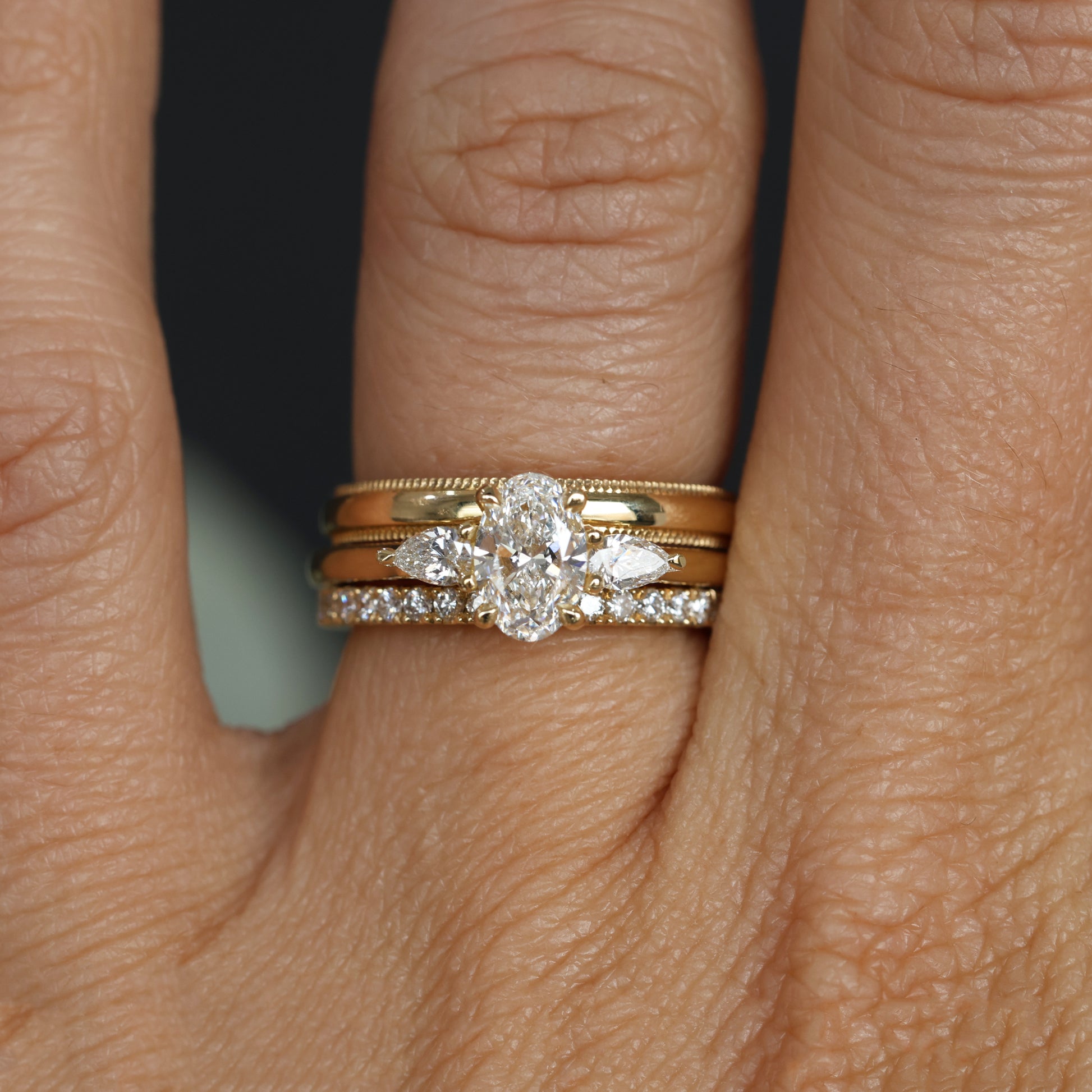 0.80ct OVAL CUT LAB DIAMOND / TRILOGY RING