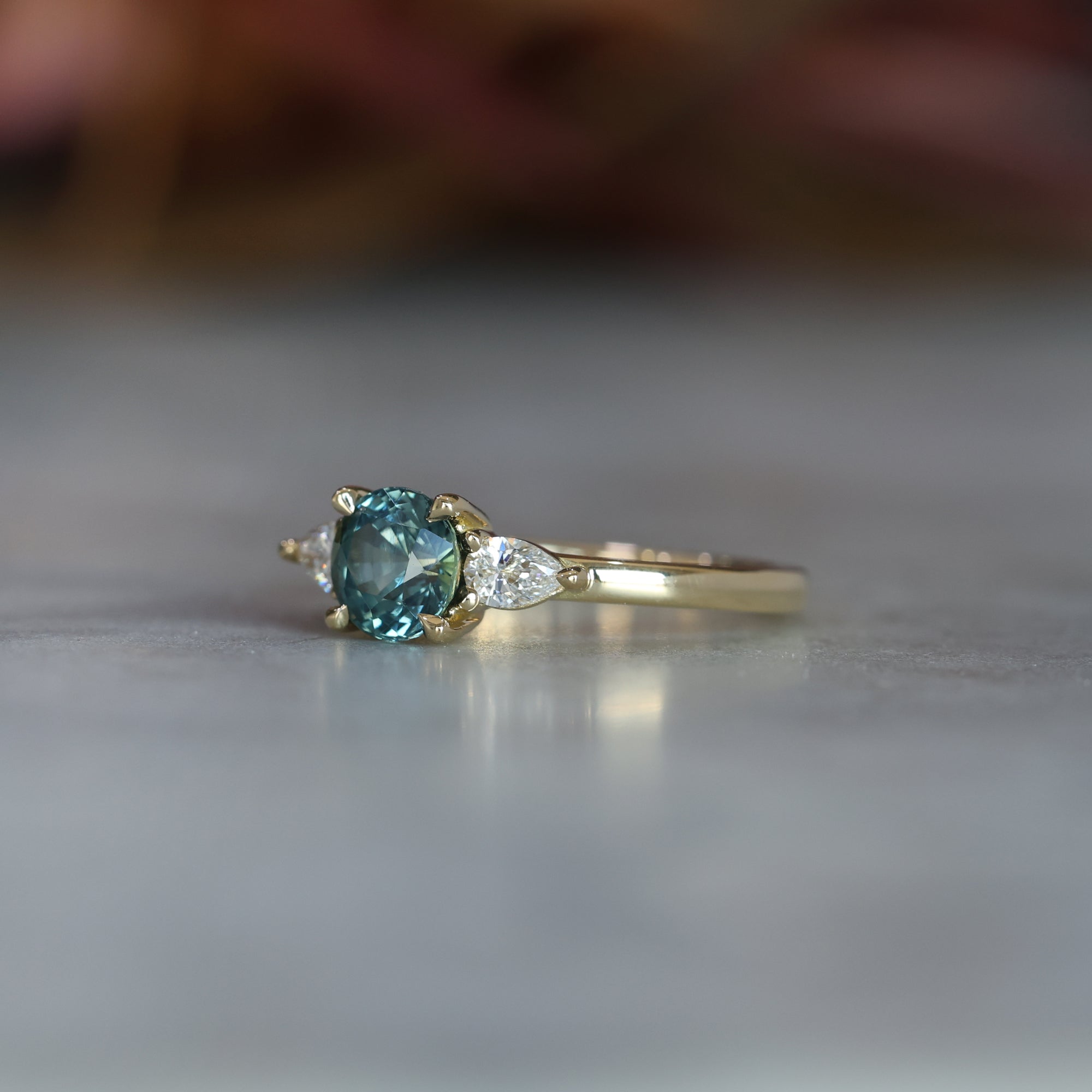 MAY TRILOGY / 1.17CT ROUND MADAGASCAN SAPPHIRE RING