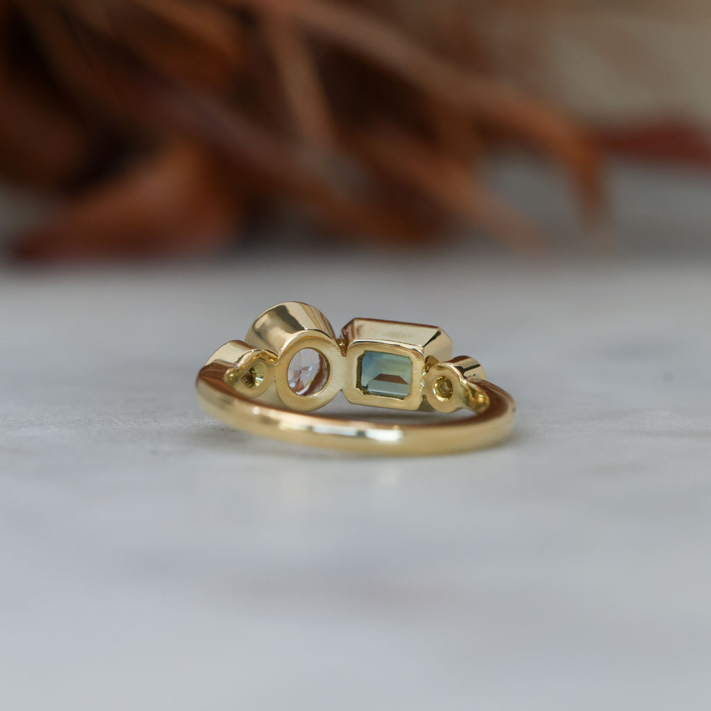 Sapphire and diamond asymmetric cluster ring, crafted in 18ct yellow gold