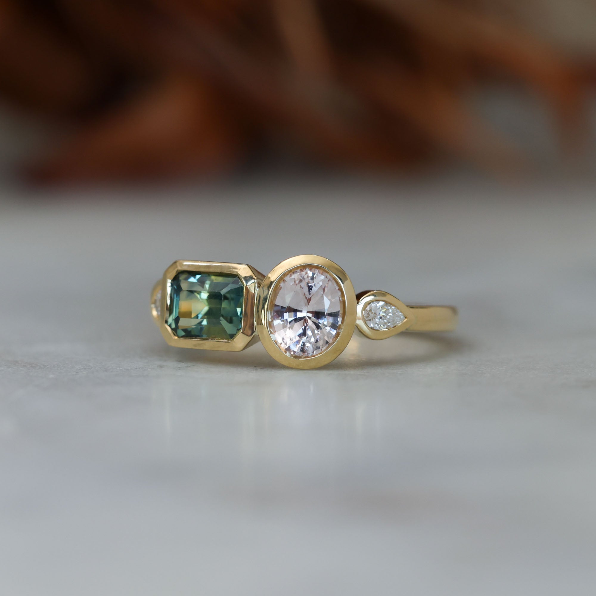 Sapphire and diamond asymmetric cluster ring, crafted in 18ct yellow gold