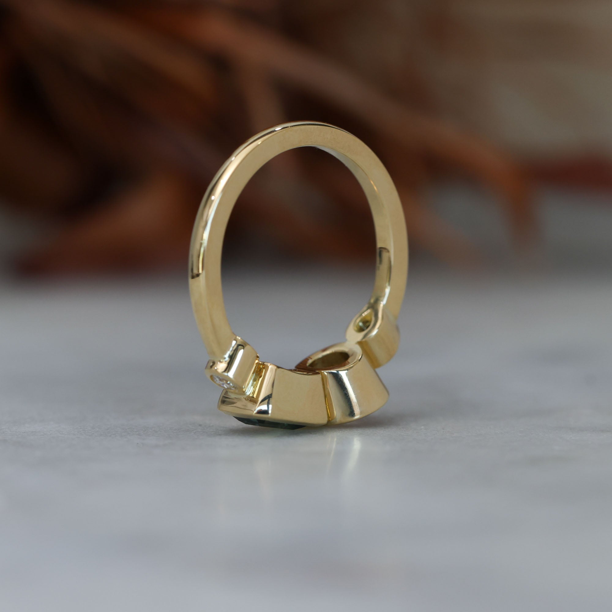 Sapphire and diamond asymmetric cluster ring, crafted in 18ct yellow gold