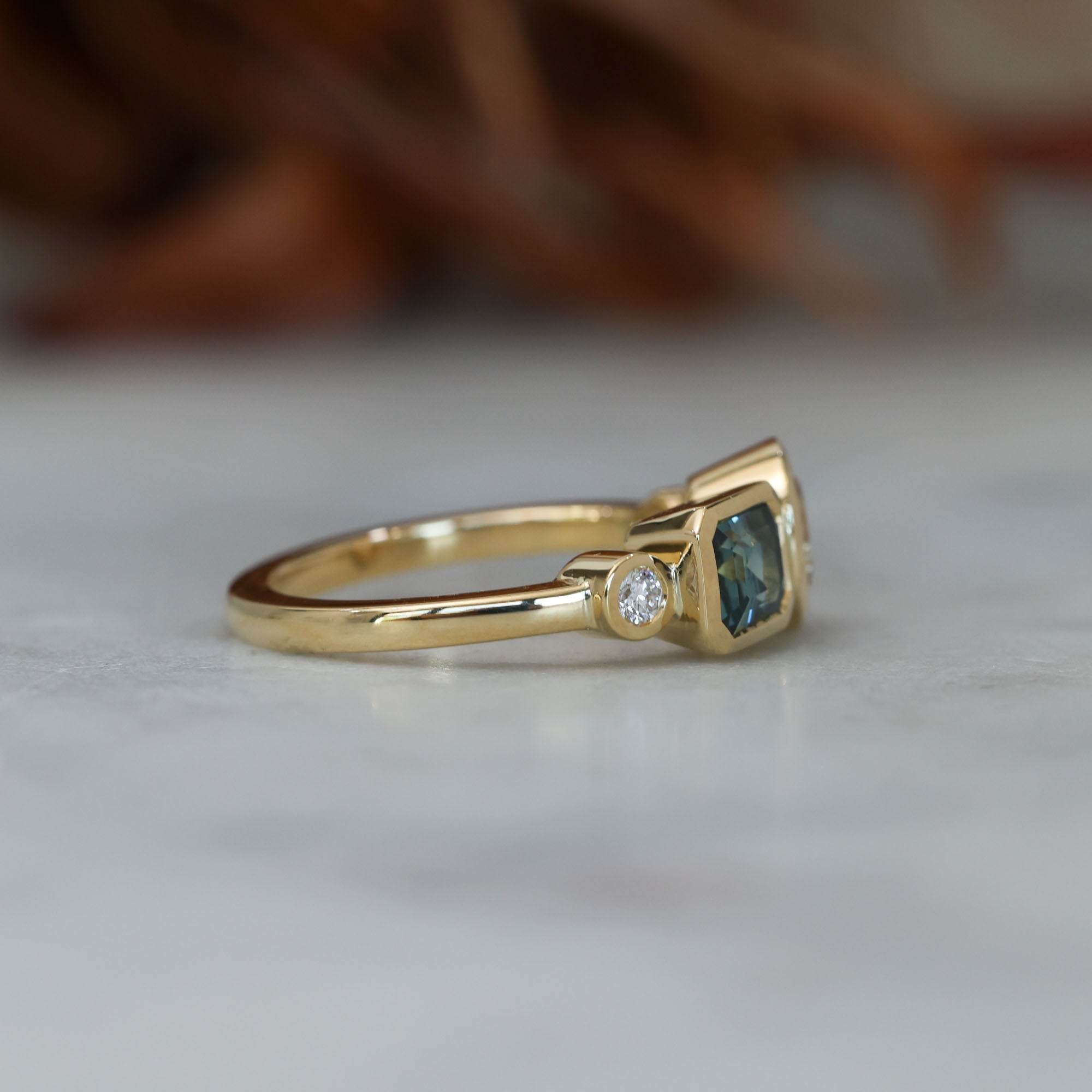 Sapphire and diamond asymmetric cluster ring, crafted in 18ct yellow gold