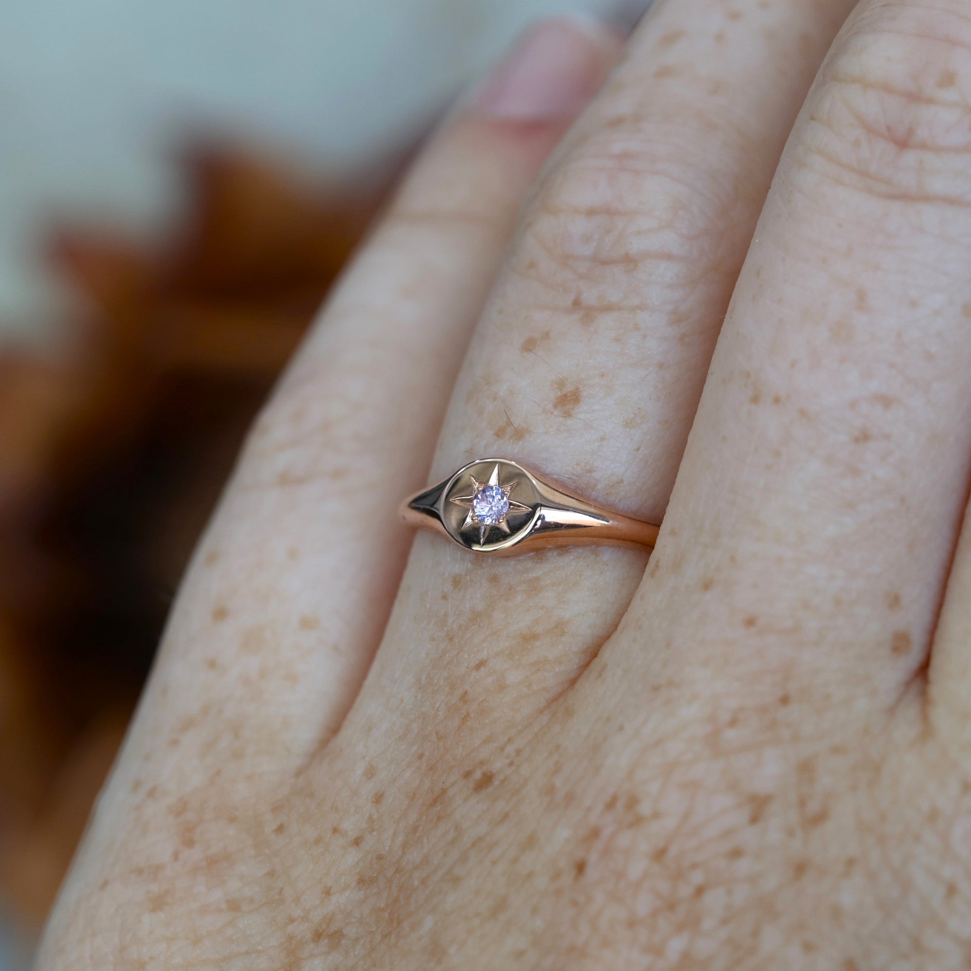Star Set Pink Sapphire Signet Ring on hand