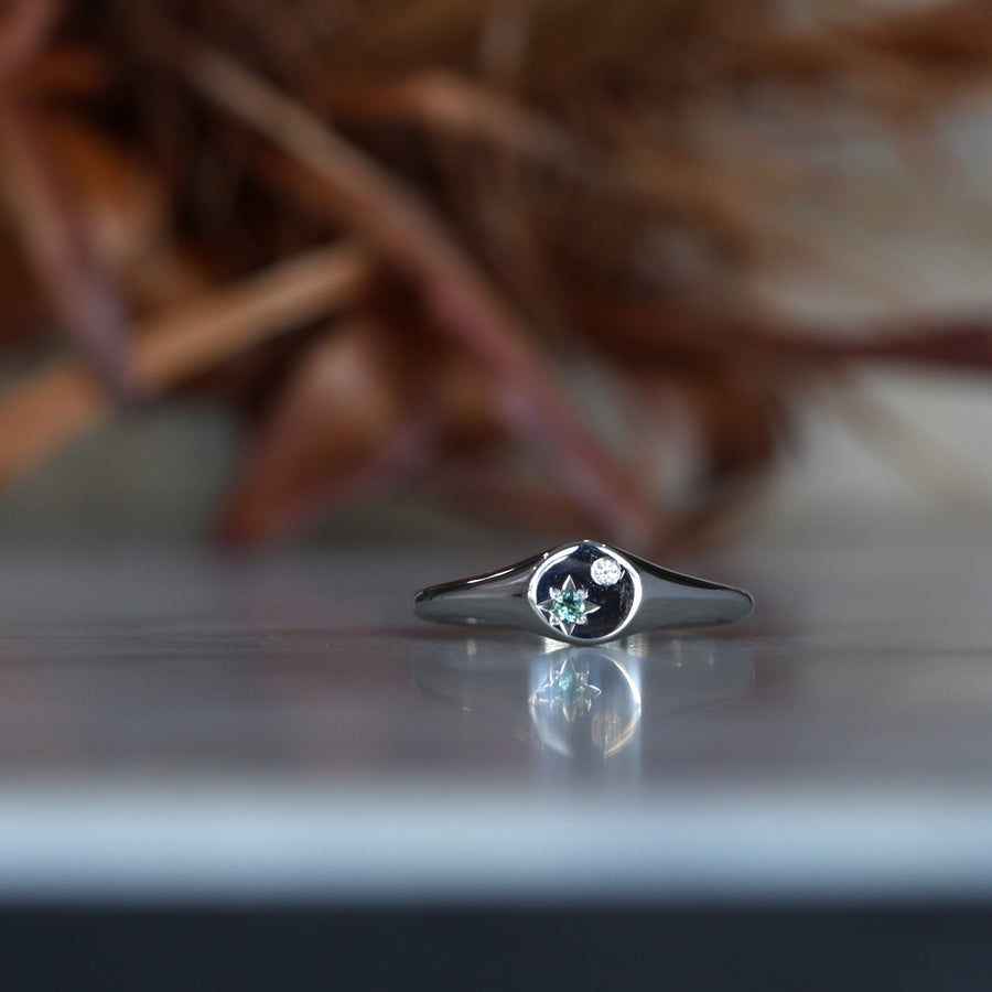 Star Set Sapphire and Diamond Signet Ring on hand