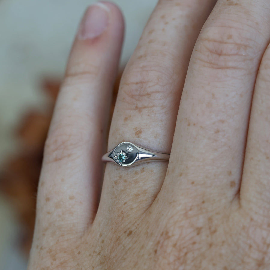 Star Set Sapphire and Diamond Signet Ring on hand