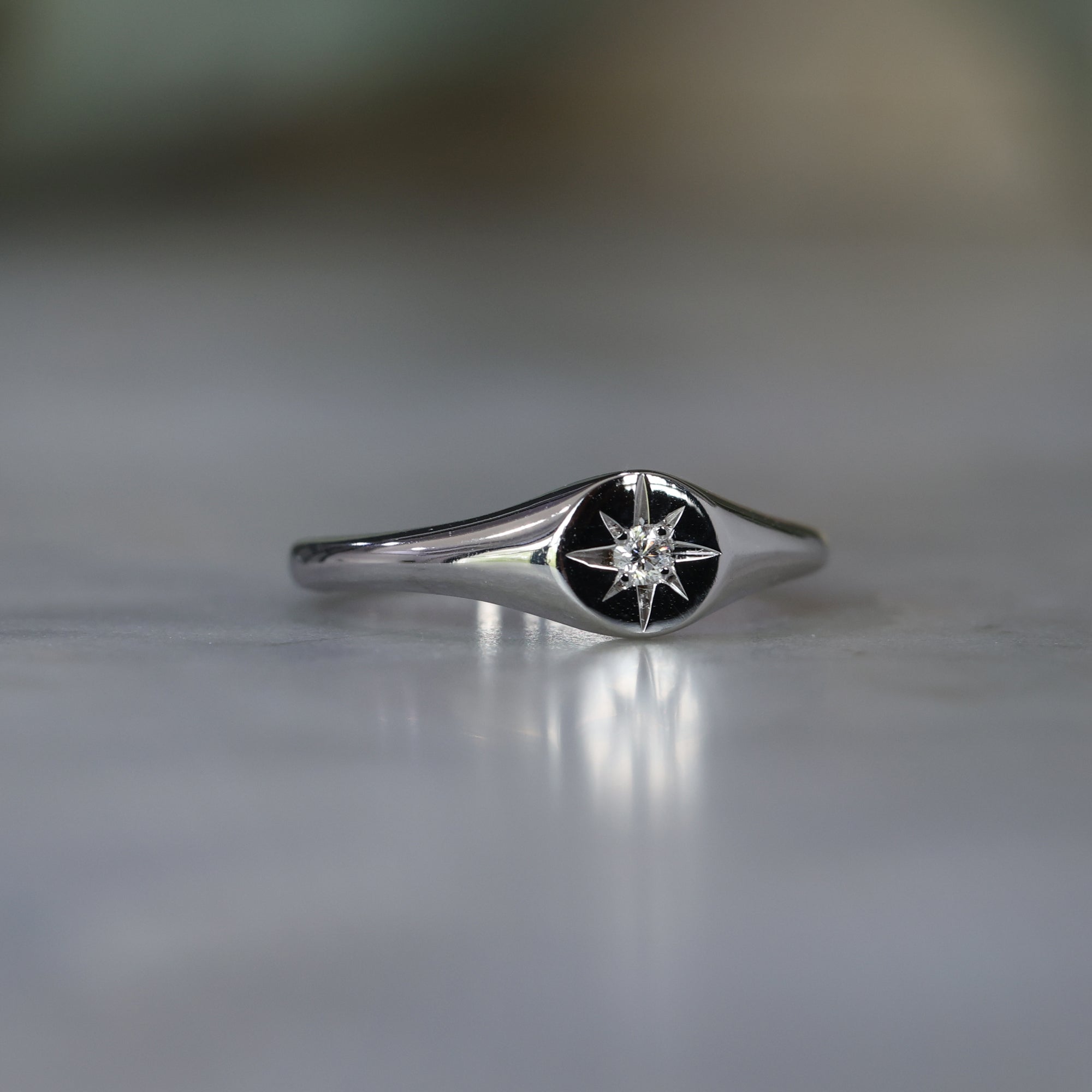 Star set White diamond signet ring