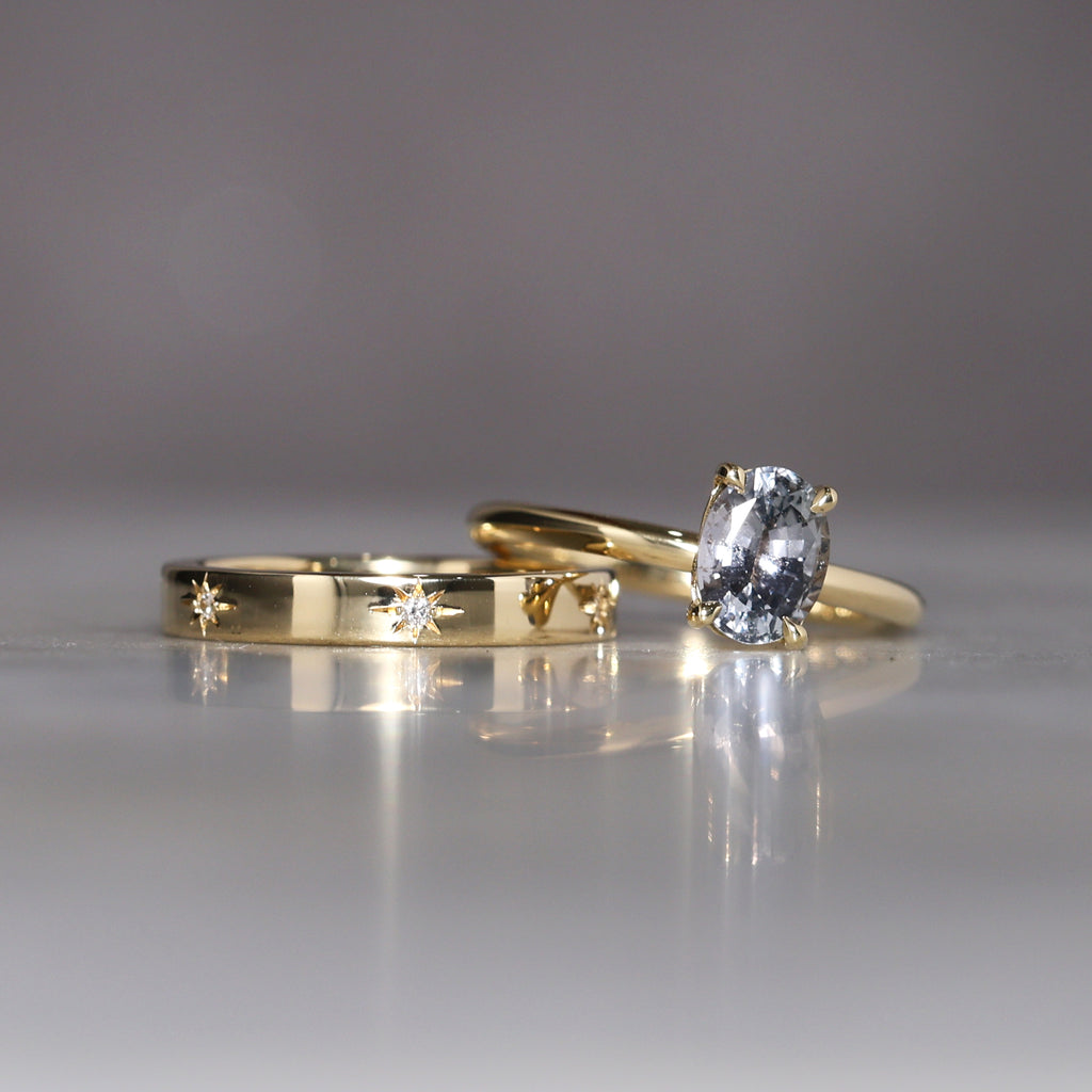 gold cigar wedding band with star set diamonds