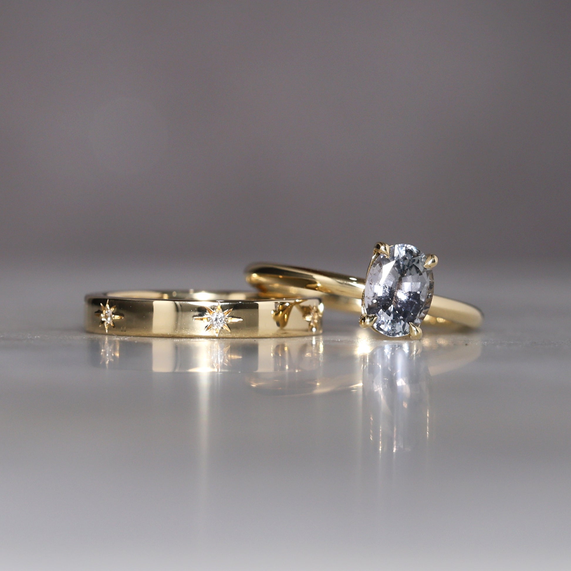 gold cigar wedding band with star set diamonds