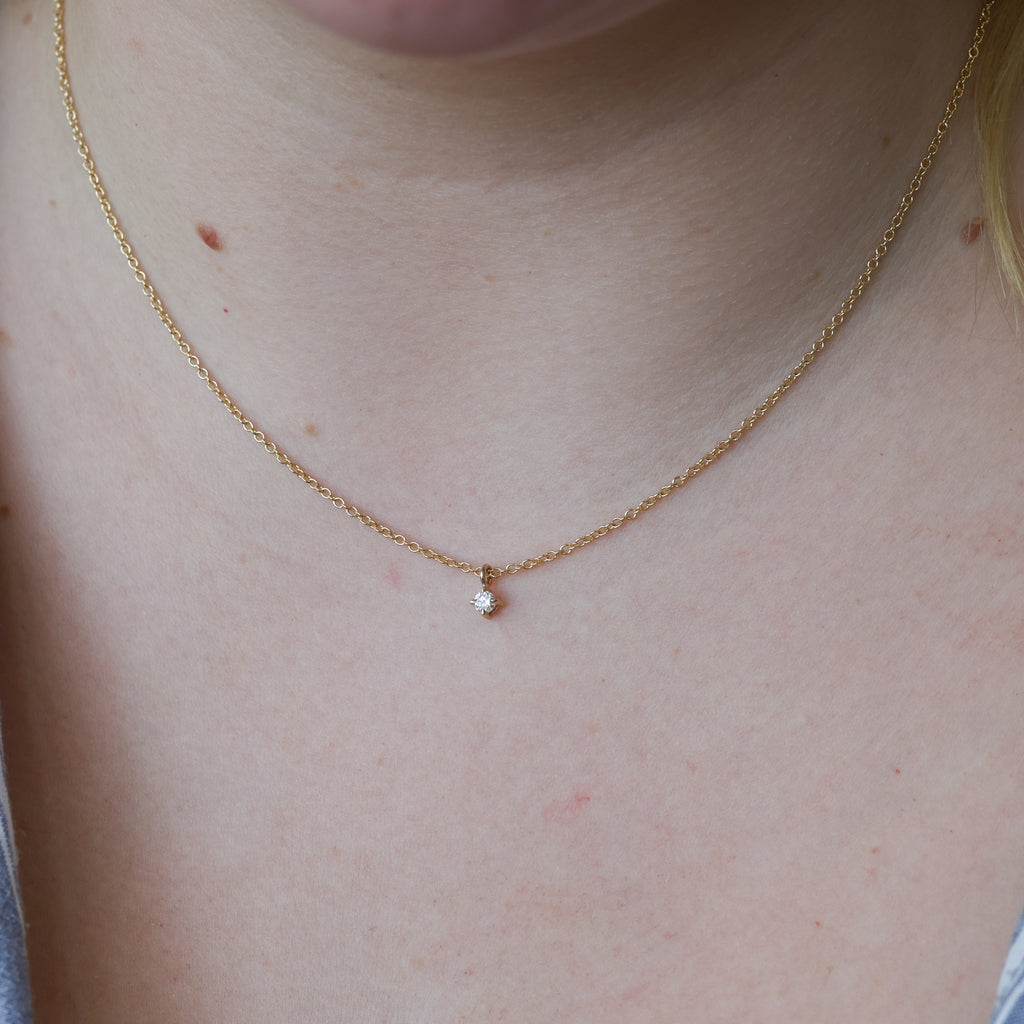 april birthstone necklace diamond on neck