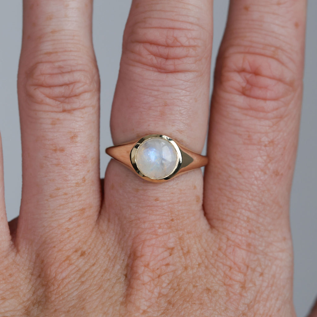 bezel cabochon ring on hand
