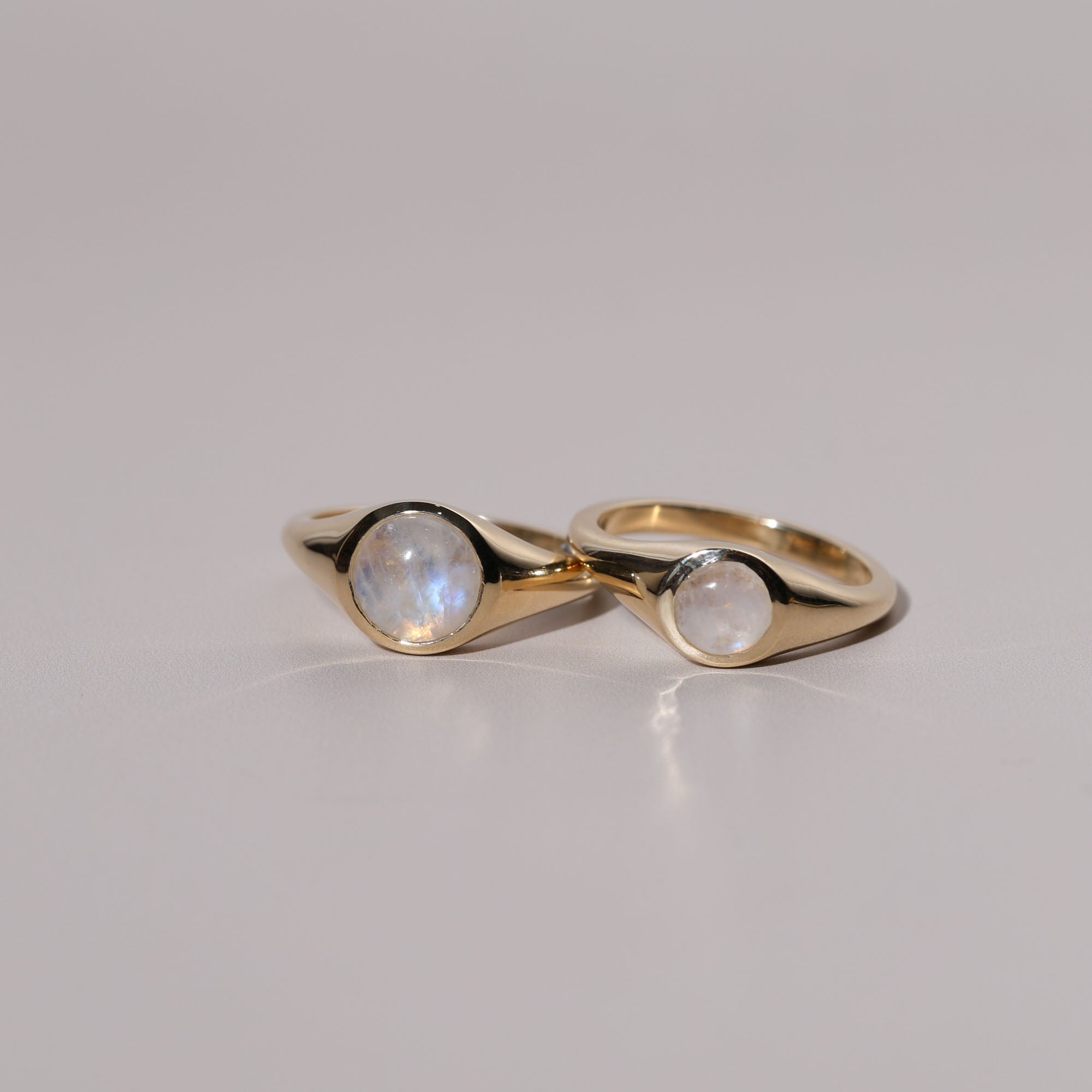 two bezel cabochon rings