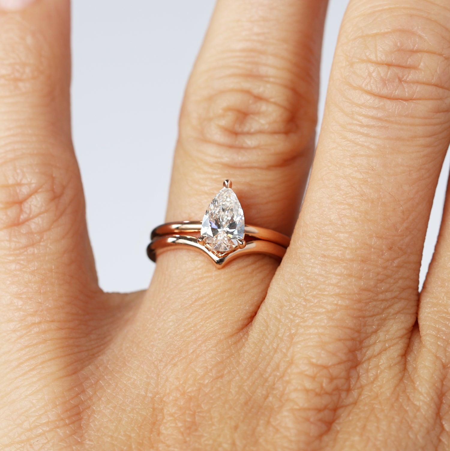 billy wedding band on hand with engagement ring