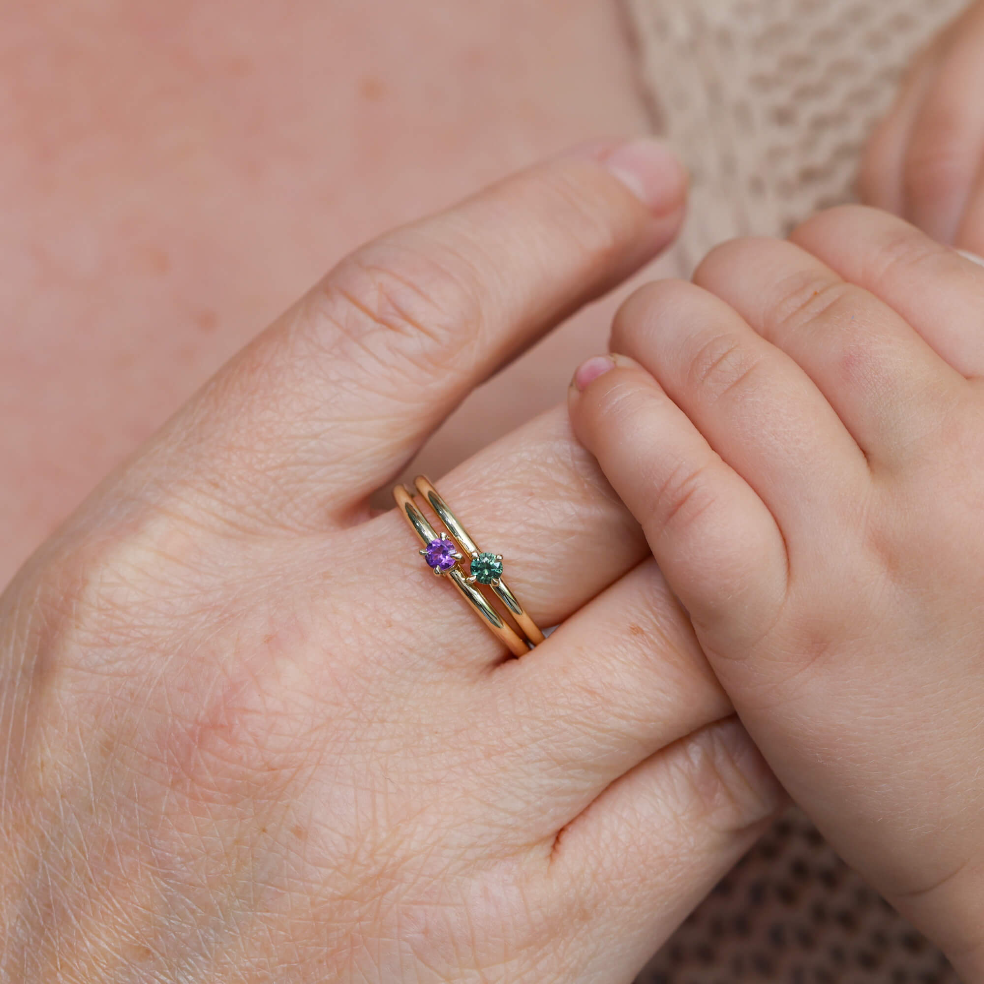 birthstone mini stack ring on hand