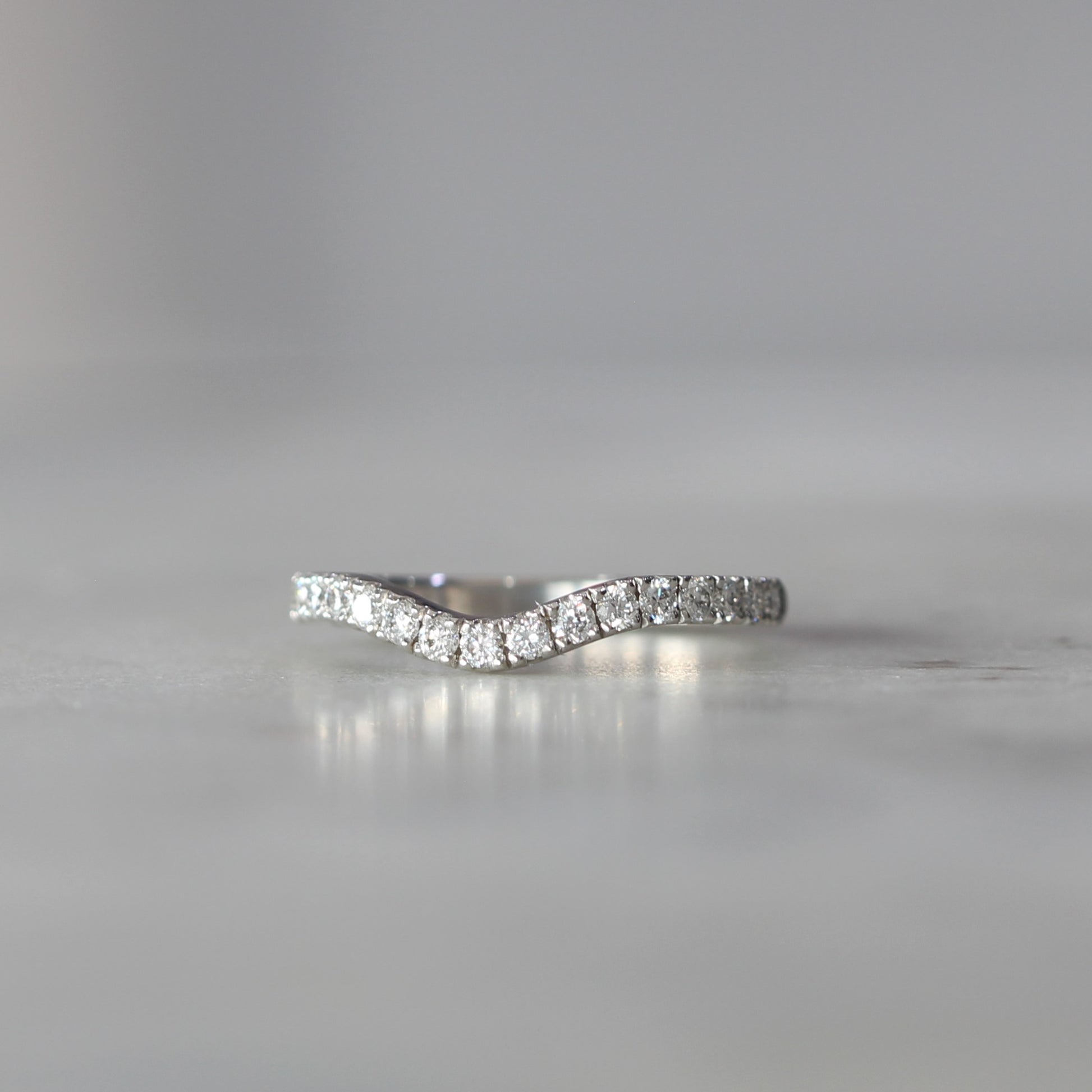 curved diamond eternity wedding band